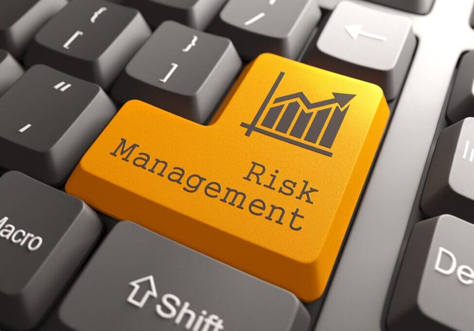 Keyboard keys with a highlighted 'Risk Management' key in orange.